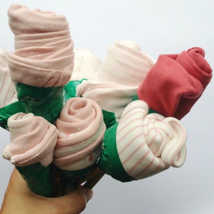 How to Make a Bouquet Out of Baby Clothes for a baby shower gift