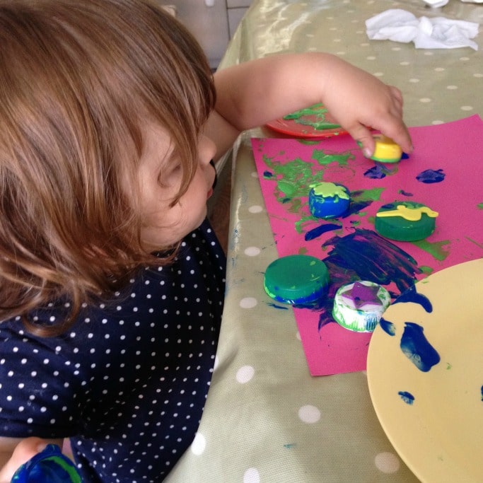 bottle top crafts making stamps for toddler art activity