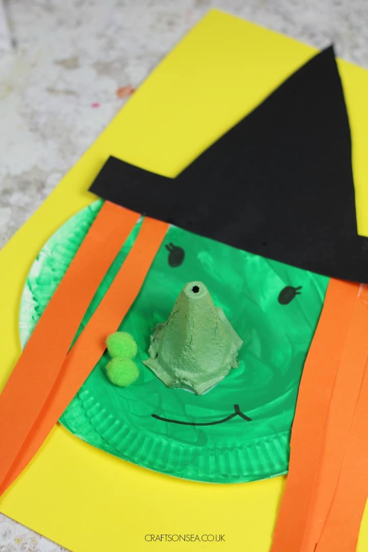 easy witch craft for kids using a paper plate and egg box