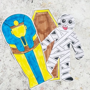 cut and paste halloween mummy craft with bandages and coffin