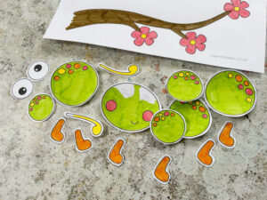 Cutting out pieces for a build a caterpillar craft