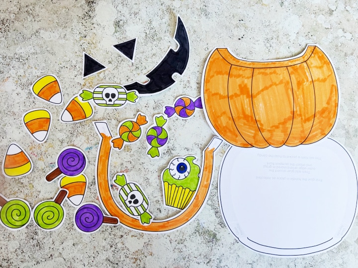 Cut out trick or treat bag pieces ready to be glued together