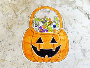 Finished DIY trick or treat bag filled with paper candy
