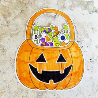 Finished DIY trick or treat bag filled with paper candy