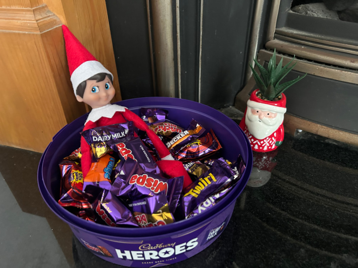 elf hiding in Christmas candy