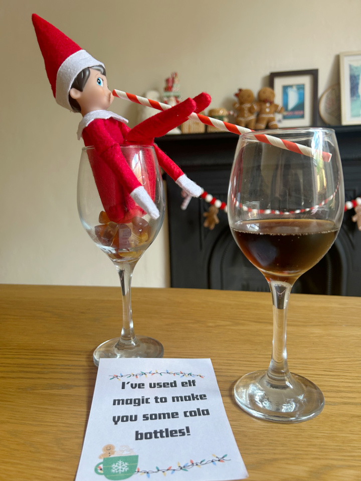 funny elf prank making cola bottles from cola