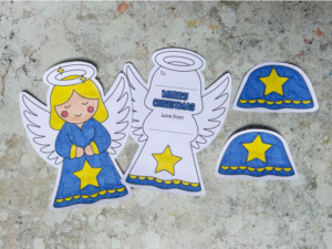 Cutting out the printable 3D angel Christmas card parts
