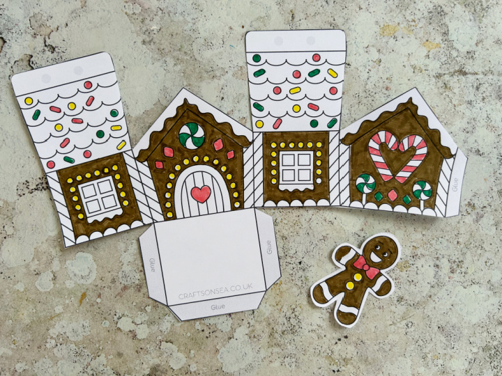cut out gingerbread house craft with gingerbread man gift tag