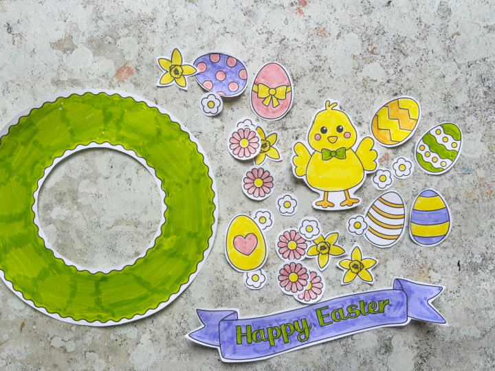 Cutting out the Easter wreath craft template for kids