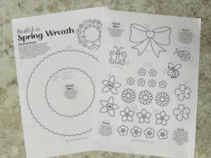 Free printable spring wreath template PDF with flowers bee butterfly and ladybug