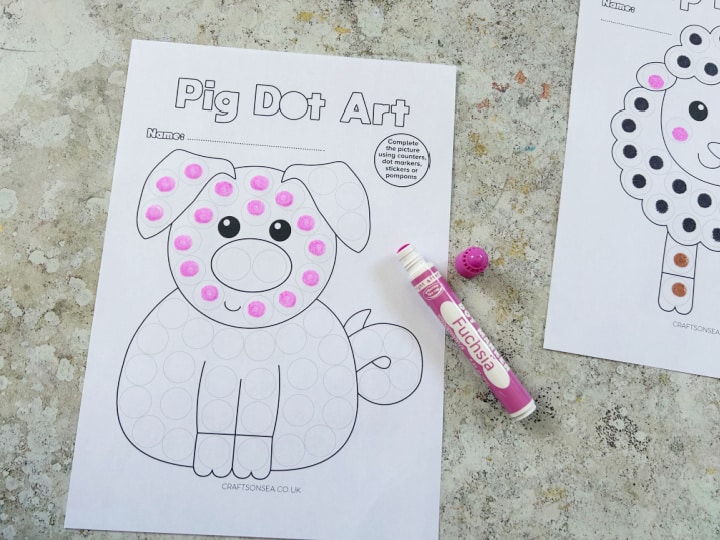 farm themed dot marker printable being colored in
