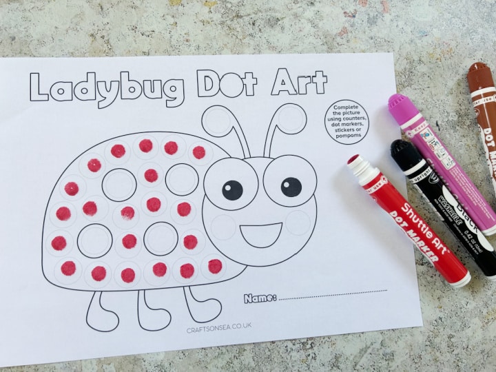Ladybug dot marker printable being colored in with dot markers