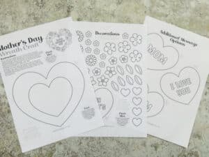 Mother’s Day wreath template with flowers and hearts printed onto white paper