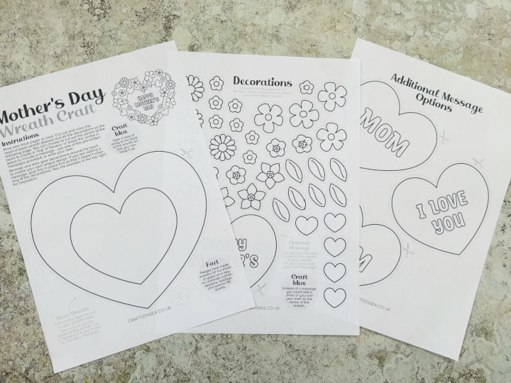 Mother’s Day wreath template with flowers and hearts printed onto white paper