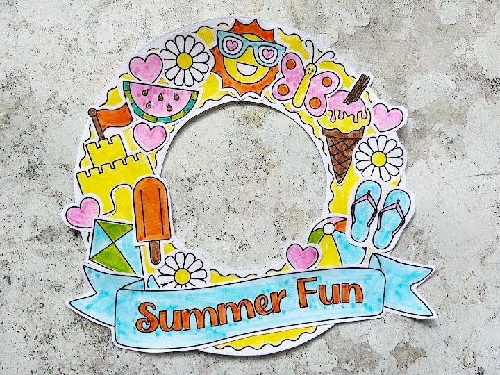 Summer fun wreath craft with sun kite sandcastle and popsicle decorations