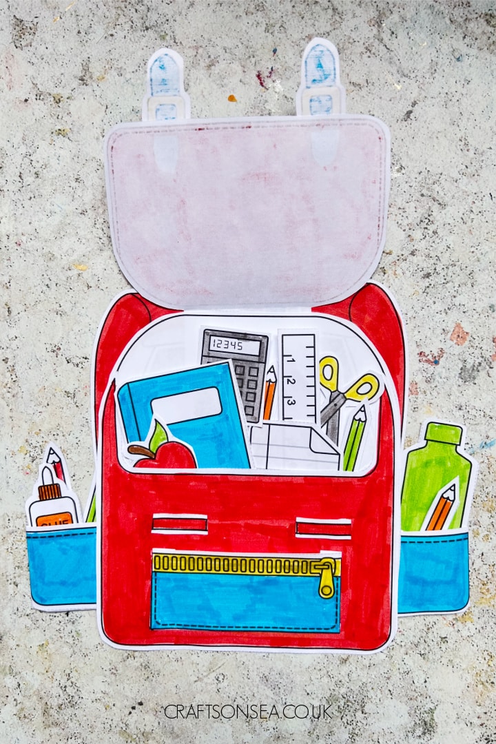 Printable backpack craft filled with paper school supplies