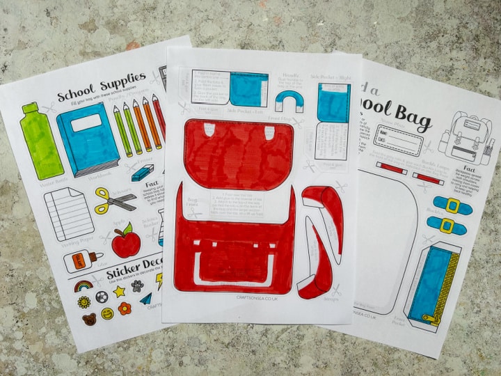 coloed in printable backpack craft template with school supplies