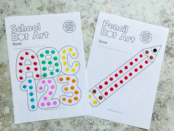 Completed back to school dot marker printables with school themed designs