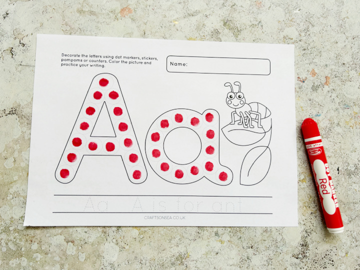 Completed letter A dot marker printable with ant illustration