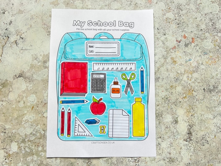 Completed My School Bag cut and paste activity with school supplies inside the bag