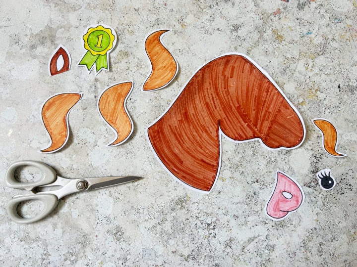Cut out horse craft pieces ready to glue together