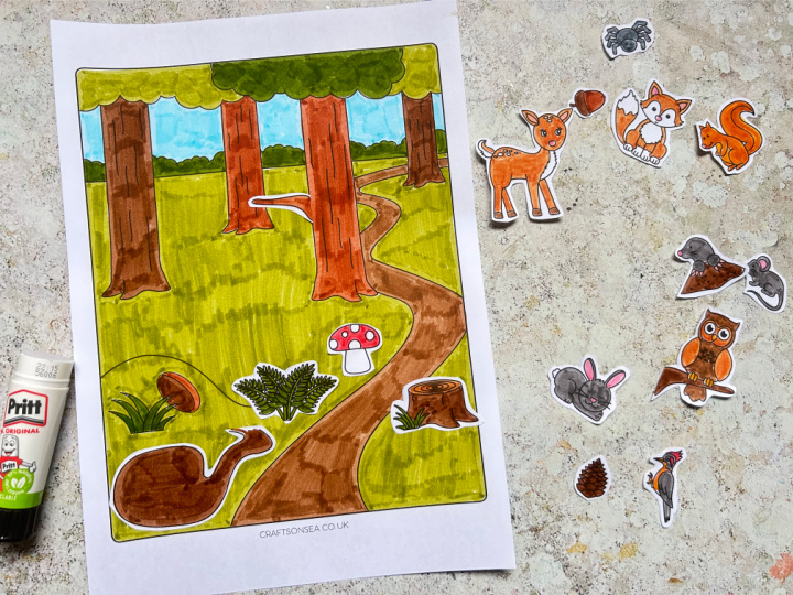 assembling the forest animals craft gluing on woodland plants