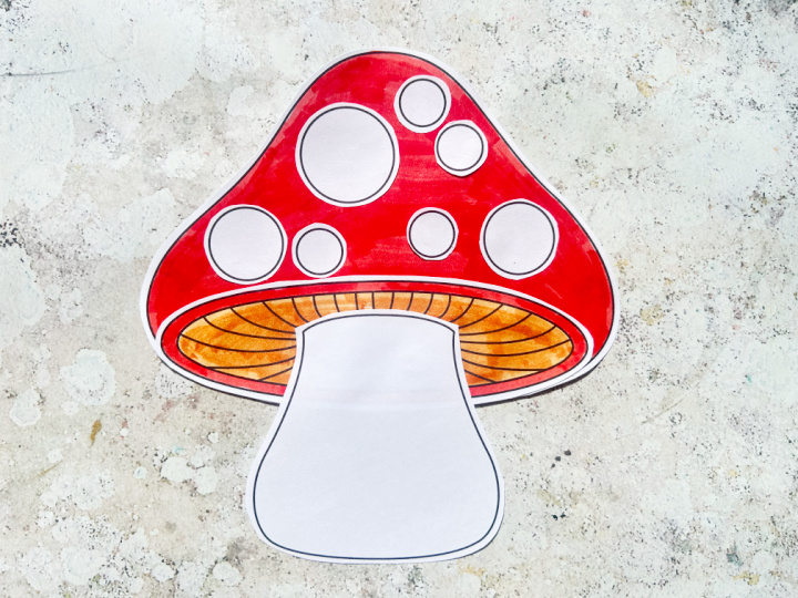 finished build a toadstool craft with white spots on a red cap