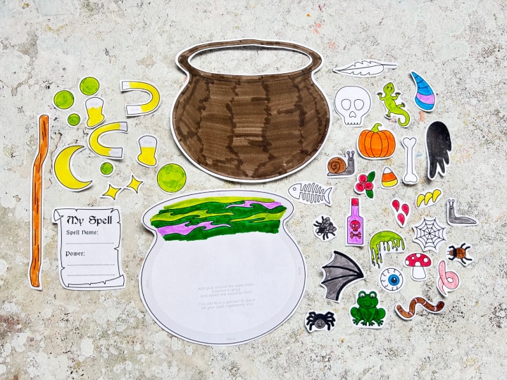 cut out pieces of the cauldron craft and spell ingredients