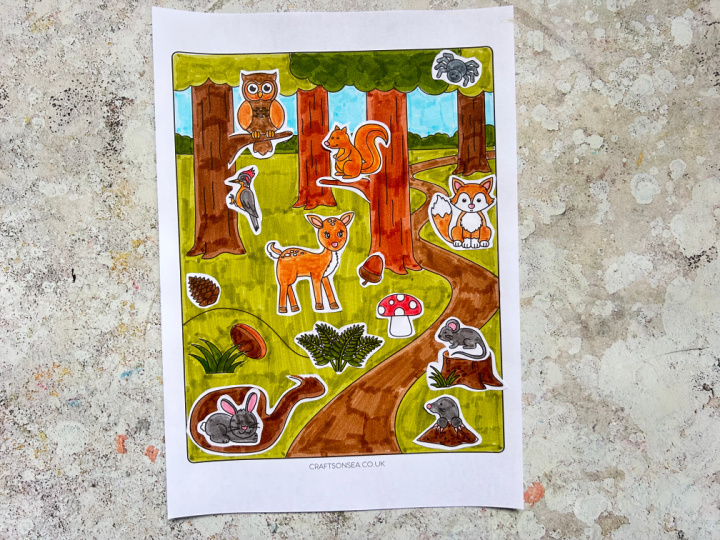 completed forest animals craft showing a woodland scene