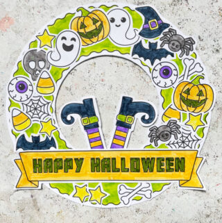 Halloween wreath craft for kids made using a free printable template