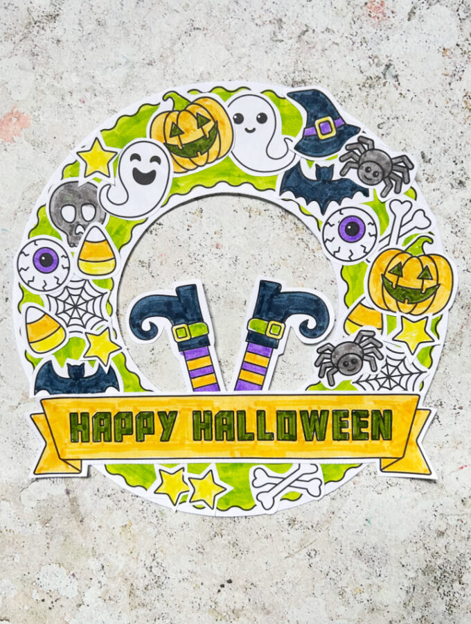 Halloween wreath craft for kids made using a free printable template
