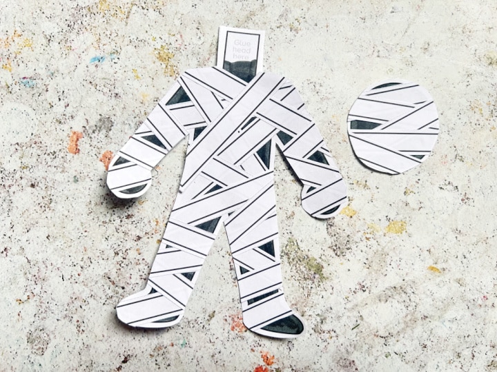 paper bandages glued onto cut and paste mummy craft